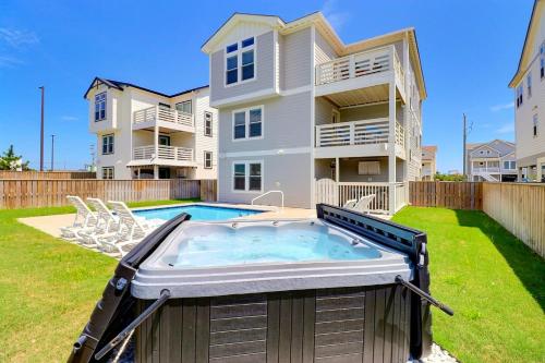 a house with a swimming pool in the yard at 4058 - Beach Haven in Kitty Hawk