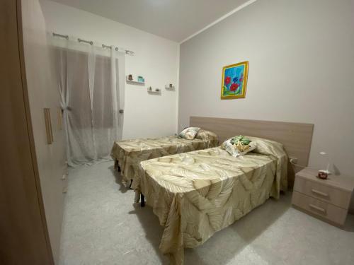 a hospital room with two beds in a room at HolidayHomePalma in Santa Maria