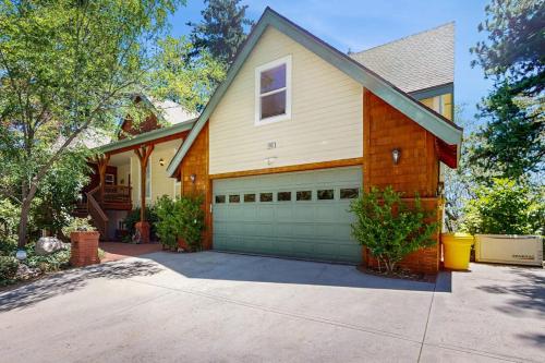 a house with a garage and a driveway at Summit Sanctuary in Lake Arrowhead
