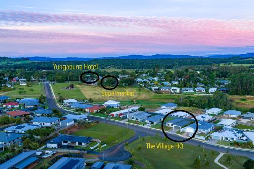 an aerial view of a small town with houses at The Village HQ in Yungaburra