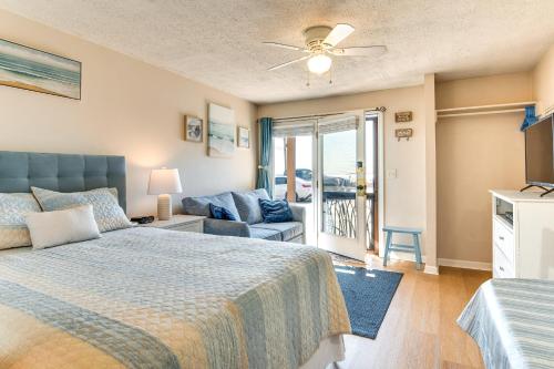a bedroom with a bed and a living room at Old Orchard Beach Condo: Steps From the Beach! in Old Orchard Beach