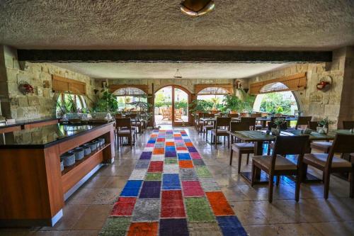 A restaurant or other place to eat at Goreme Inn Hotel Only Adult