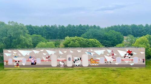 a sign with cartoon animals on it in a field at W9-Hotel ShangHai PuDong Airport - 24 hours free shuttle bus to Pudong Airport in Shanghai