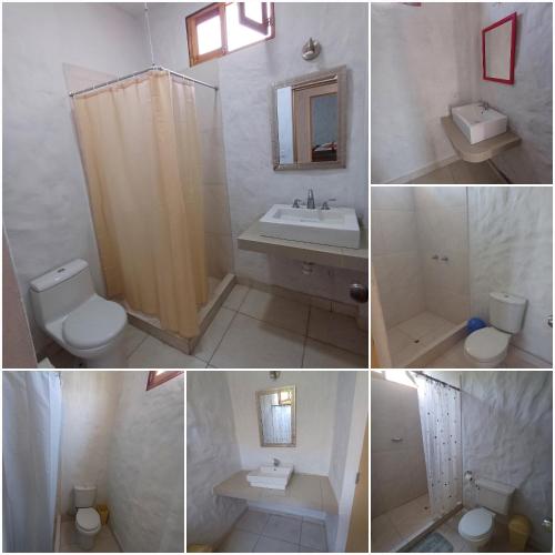 a bathroom with a sink toilet and a shower at Villa Luna in Chincha
