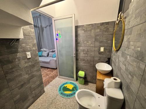 a bathroom with a shower and a toilet and a sink at Private Pool Villa Near Bacalar Lagoon in Xul-Ha