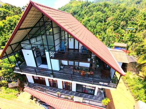 an aerial view of a house with a roof at Mountain Breeze Villa & Ayurveda Spa in Ella