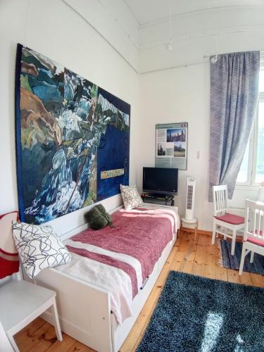 Llit o llits en una habitació de Tornihuone