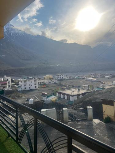 a view of a city with a mountain in the background at Bittu Homestay in Kaza