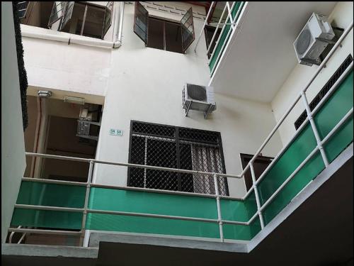an overhead view of a balcony of a building at White House Hotel Kluang in Kluang