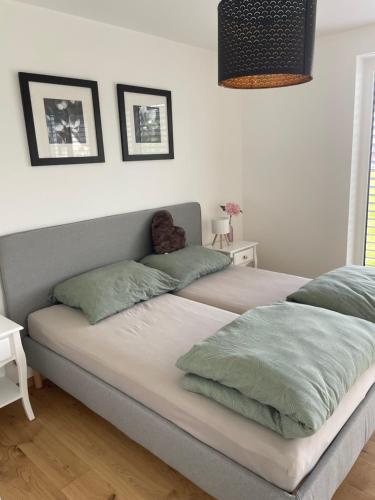 two beds in a room with at Schoberblick in Thalgau