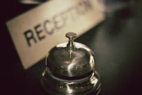 a close up of a metal bell on a table at Hotell Siesta in Karlskrona
