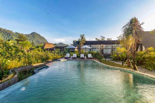 an image of a swimming pool in a villa at Anandinii Resort Sidemen by AGATA in Sidemen