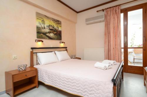 Letto o letti in una camera di Valetta Inn