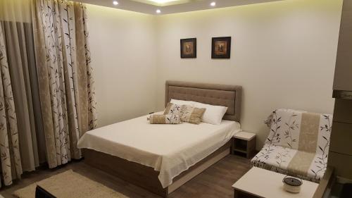 Ένα ή περισσότερα κρεβάτια σε δωμάτιο στο Apartman Mia Milmari