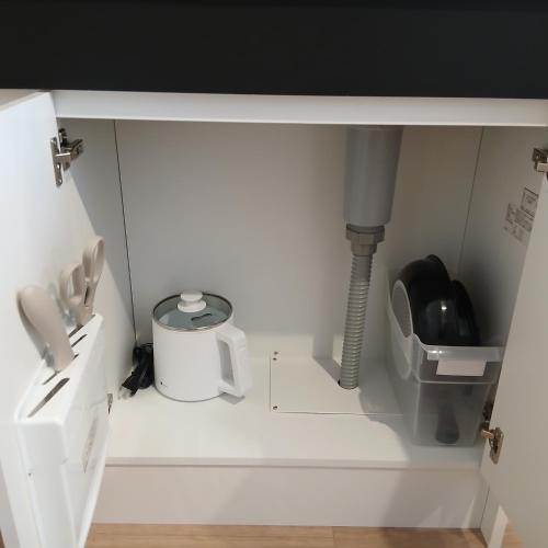 a bathroom with a sink and a toilet in it at Hotel Route35 Shiomi in Sasebo