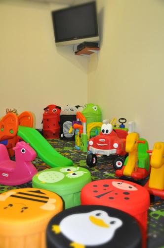 a room with a bunch of toys on the floor at Hotel Nadmorski in Gdynia