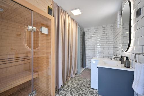 a bathroom with a sink and a shower at 4 bedroom home Sigma in Zlatar