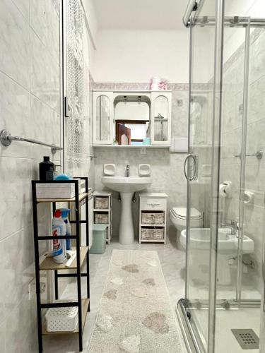a bathroom with a shower and a toilet and a sink at Perfect Wave a 10 m dal mare in Sanremo