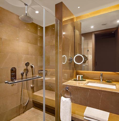 a bathroom with a shower and a sink at The G Hotels Istanbul in Istanbul