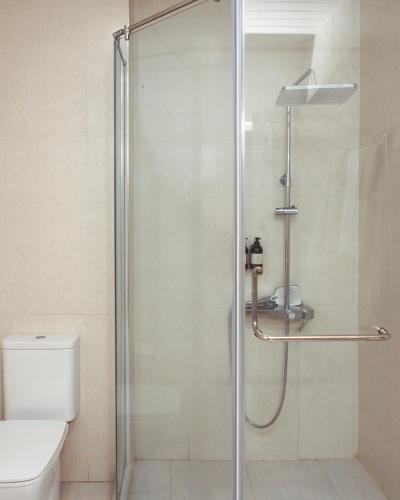 a shower stall in a bathroom with a toilet at GetAp Resort Arzni in Arzni