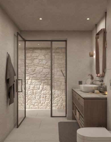 a bathroom with a shower and a toilet and a sink at Eleni Village & Suites in Amoudara Herakliou