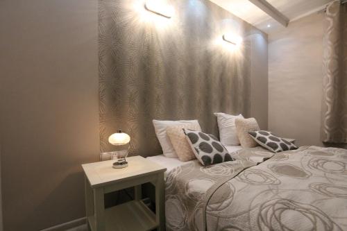 Posteľ alebo postele v izbe v ubytovaní Modern
