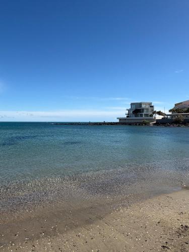 Appartement à 1 min de la plage, parking inclus