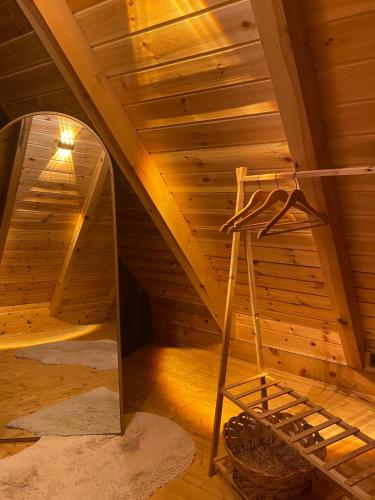 a room with a ladder in a attic at Doğa ile başbaşa dağ evi in Karadere