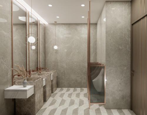 a bathroom with a shower and a sink at Ginger Gadchiroli in Garhchiroli