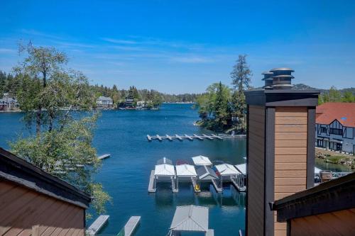 a view of a dock with boats in the water at Village Lakefront Paradise in Lake Arrowhead