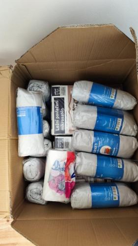 a box filled with a bunch of toilet paper at Apartmán pro 6 osob, Most M2 in Most