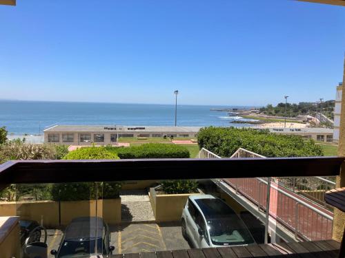 a view of a parking lot with cars parked at Oceanview 4 U - Close to Lisbon! in Oeiras