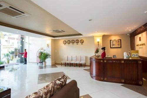 a lobby of a hospital with a reception desk at White Lion Hotel in Ho Chi Minh City