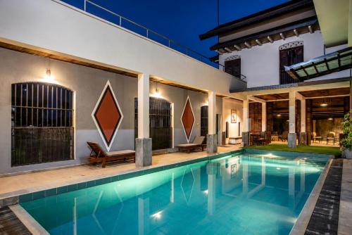 an image of a swimming pool in a house at Serenity Lake Front Villa in Moratuwa