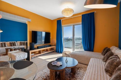 Luxury 2BR Yas Island Apt with Pool & F1 Views