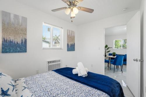 a bedroom with a bed and a ceiling fan at 11432 Lincoln Blvd in Richmond Heights