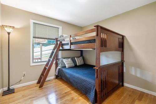 a bedroom with two bunk beds in a room at Cozy Corner in Oswego