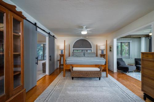 a bedroom with a bed and a living room at 2264 Seascape Crt. in Seabrook Island