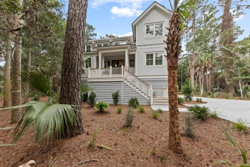 a house in the woods with trees at 3290 Coon Hollow in Seabrook Island