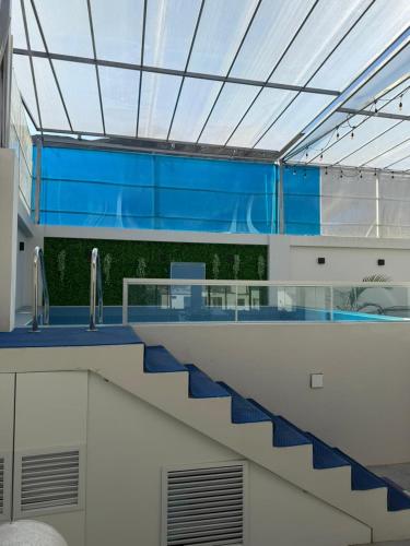 a staircase in a building with a glass ceiling at Casa Apartment Playa Tortugas in Tortuga
