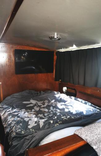 a bed in the back of a boat at Eco Yacht Charters in Almere