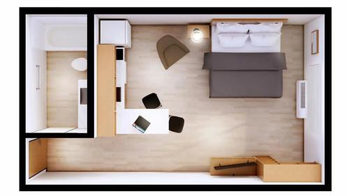 a floor plan of a small room with boxes at LivAway Suite Tucson in Tucson