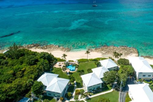 an aerial view of a house on the beach at Cocoplum #1 Condo in George Town