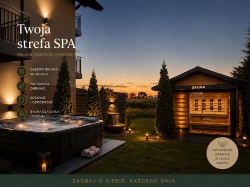 a house with a hot tub in the yard at ROYAL Villa RESORT & SPA - Jacuzzi, Sauna, MELEX na plażę, Masaże, Apartamenty z kuchnią, Widok na Zalew Wiślany in Krynica Morska
