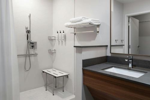 a bathroom with a sink and a shower at Fairfield by Marriott Inn & Suites Corbin in Corbin