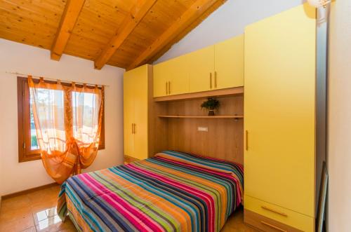 Cama o camas de una habitación en Residence Borgo Stella Marina