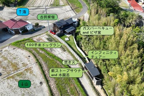 a group of street signs on a train track at 古民家宿 AKIYA cornerstone 淡路島 サウナ ドッグラン in Awaji