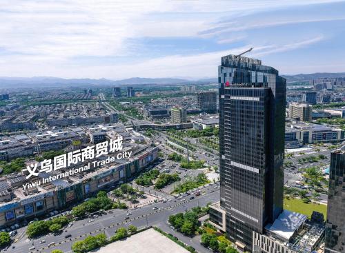 an aerial view of a tall building in a city at Yiwu Marriott Hotel in Yiwu