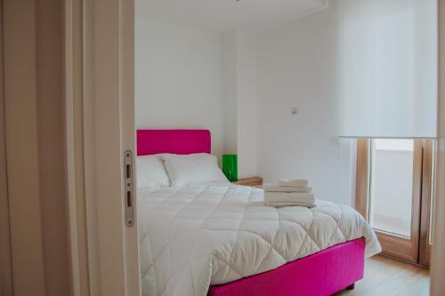Postel nebo postele na pokoji v ubytování New Suite Lecce