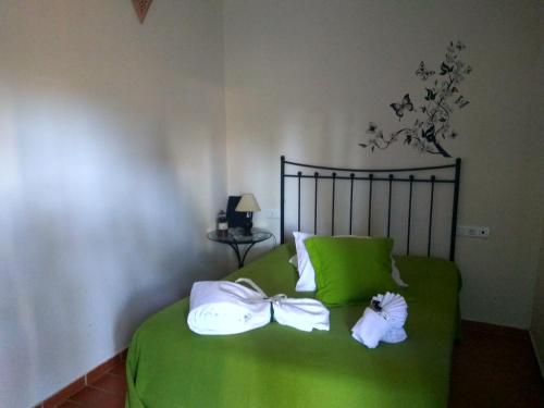 Katil atau katil-katil dalam bilik di Hotel Rural Terrablanca